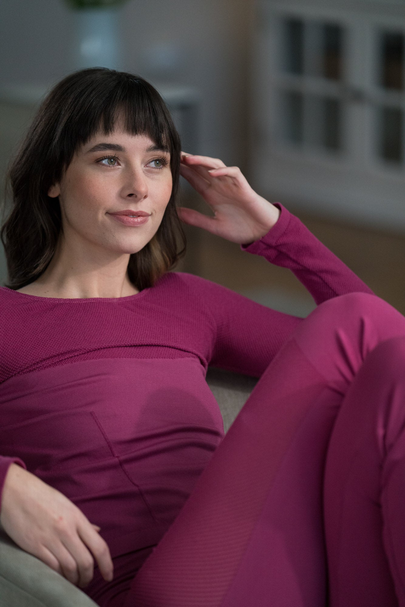 woman relaxing wearing katoa manuka-infused activewear in purple